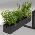 a planter with plants in it