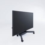 a black screen lowered on a stand